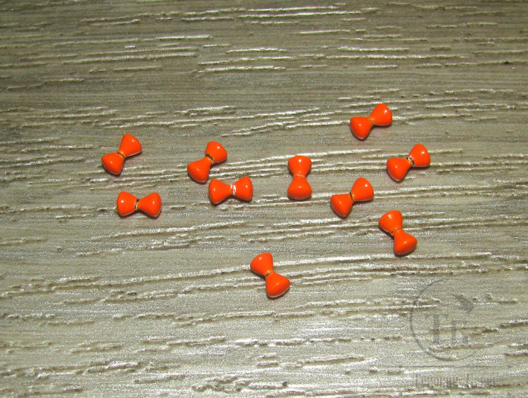 Глазки гантельки латунные Fl. Orange 3,2 mm 1/8 (уп 10 шт)