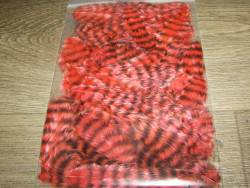 Перья петуха Grizzly Chikabou Fl. Red Терский берег