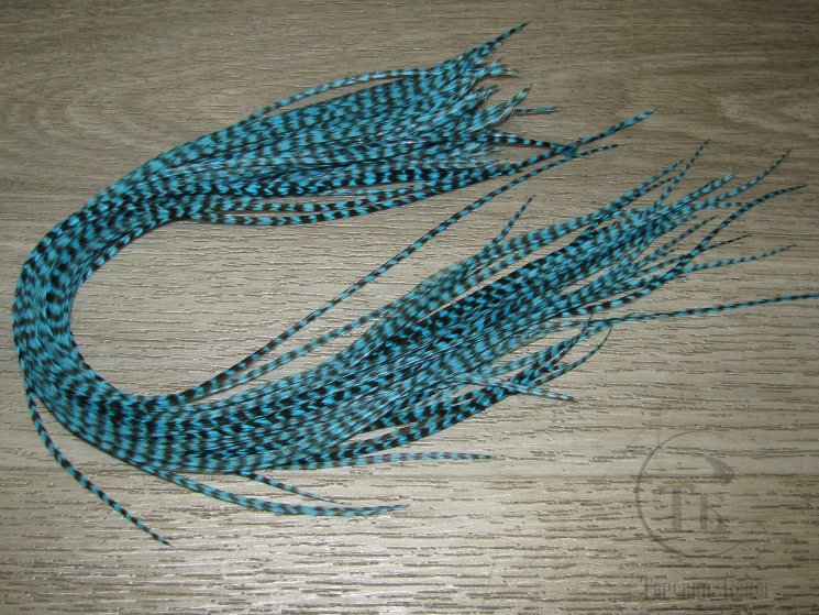 Перо из седла петуха отборное ( 1 шт ) Гризли  голубой XL / Grizzly Lt. Blue XL
